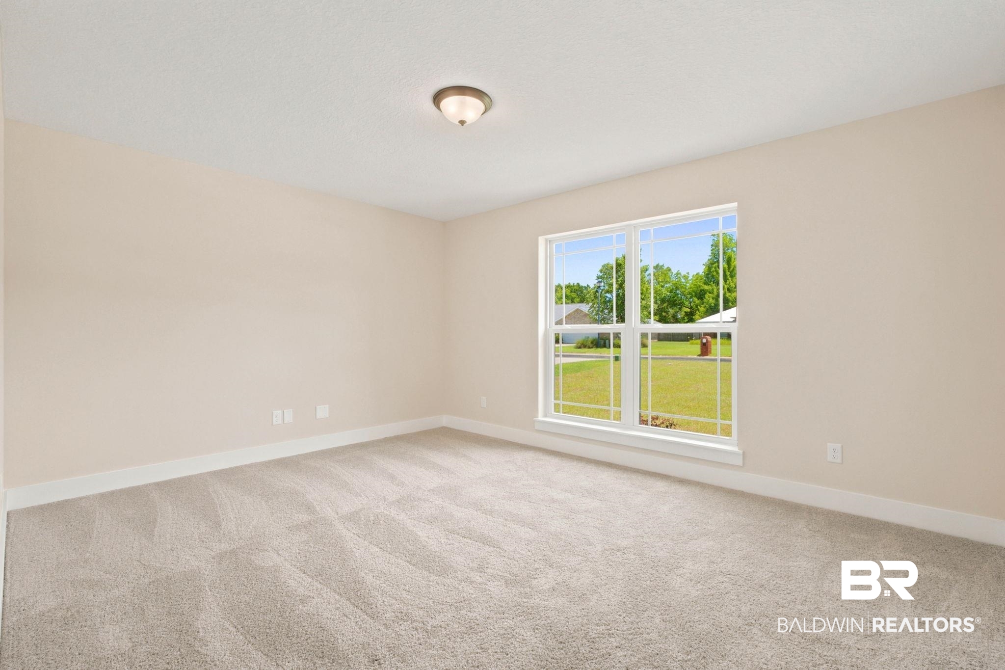 32656 Arbor Ridge Circle Lillian, AL 36549 - Photo 21 of 56 Spacious room with plush carpet flooring and neutral wall tones