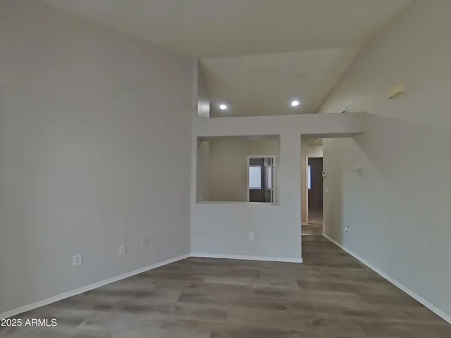 a view of hallway with livingroom