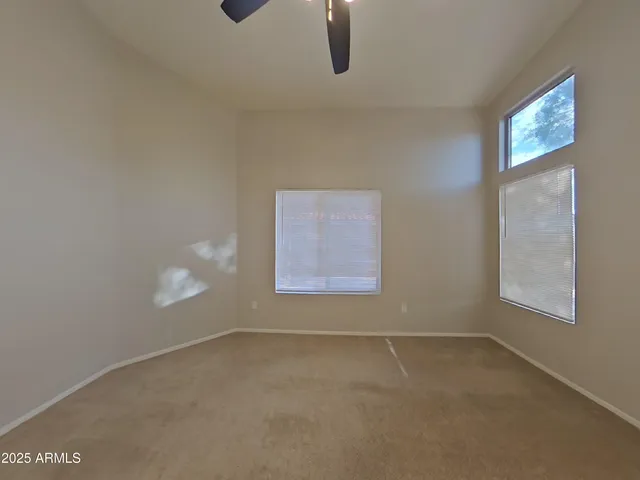 an empty room with windows