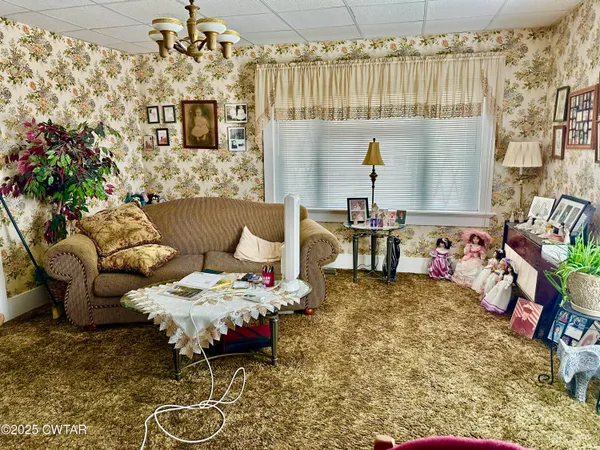 a view of a living room and a window