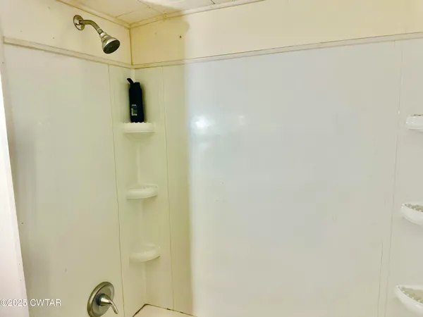 a bathroom with a sink and a shower