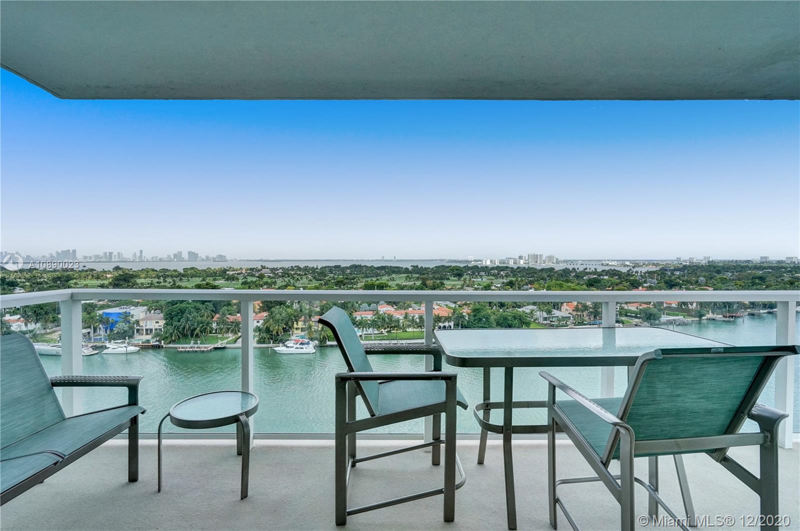5750 Collins Avenue, Unit 15F Miami Beach, FL 33140 - Photo 19 of 65 a view of chairs and table in a terrace