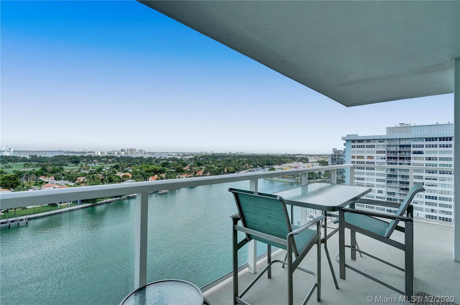 5750 Collins Avenue, Unit 15F Miami Beach, FL 33140 - Photo 20 of 65 a view of a chairs and table in patio