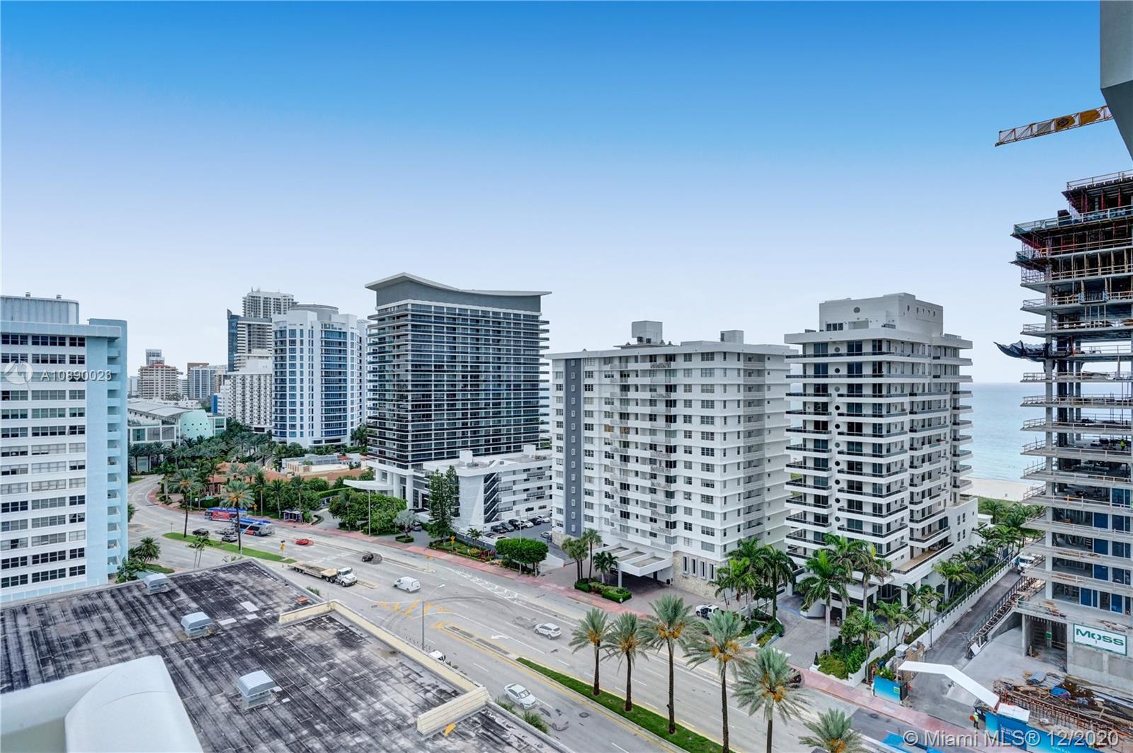 5750 Collins Avenue, Unit 15F Miami Beach, FL 33140 - Photo 51 of 65 a city view with tall buildings