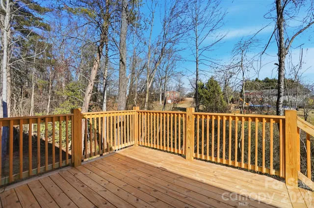 a view of a wooden roof deck