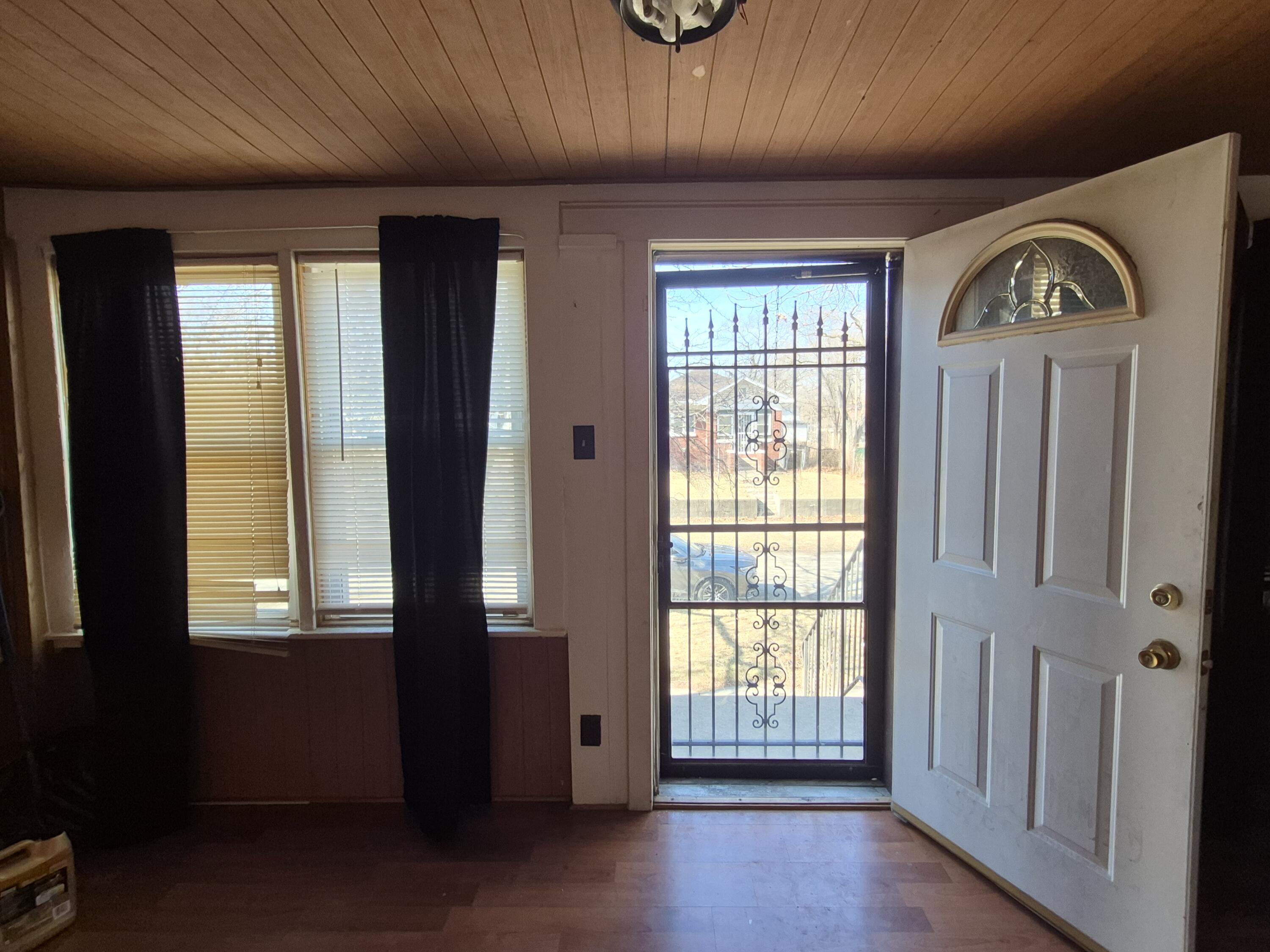 395 Porter Street Gary, IN 46406 - Photo 4 of 14 an empty room with windows