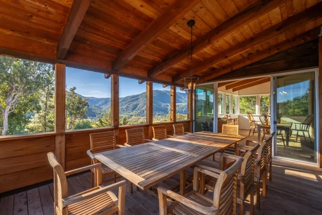 a bathroom with a tub shower and sink