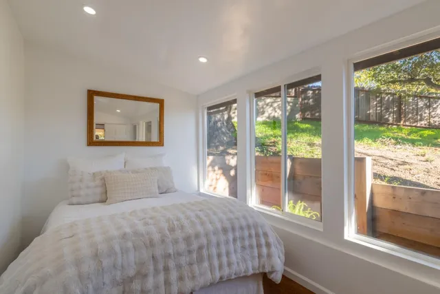 a view of table and chair under an umbrella