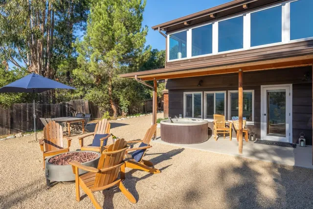 a bedroom with a bed and a lamp