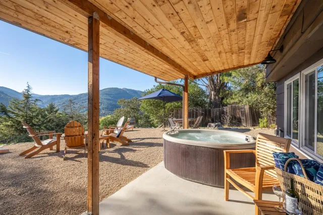 a bedroom with a bed and a view of bathroom