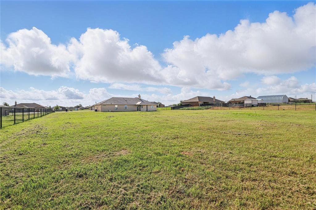 240 Springwood Ranch Loop Springtown, TX 76082 - Photo 26 of 27 a view of an ocean and beach