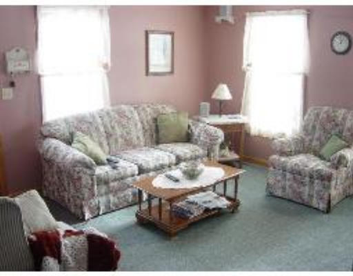 823 Orange Road Warwick, MA 01378 - Photo 4 of 8 a living room with furniture and a couch
