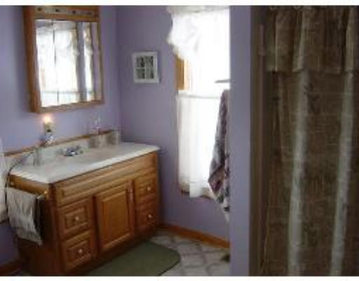 823 Orange Road Warwick, MA 01378 - Photo 8 of 8 a utility room with dryer and washer