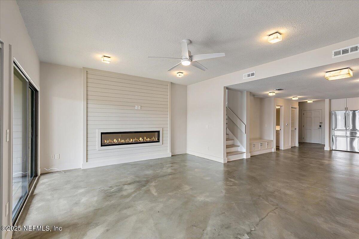 41 Fishermans Cove Road Ponte Vedra Beach, FL 32082 - Photo 11 of 36 a view of a hallway with a ceiling fan