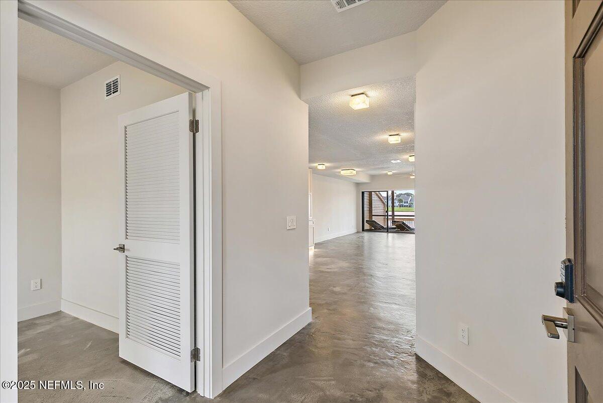 41 Fishermans Cove Road Ponte Vedra Beach, FL 32082 - Photo 17 of 36 a view of a hallway view with three rooms