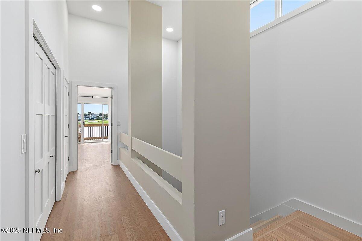 41 Fishermans Cove Road Ponte Vedra Beach, FL 32082 - Photo 20 of 36 a view of a hallway with wooden floor and staircase
