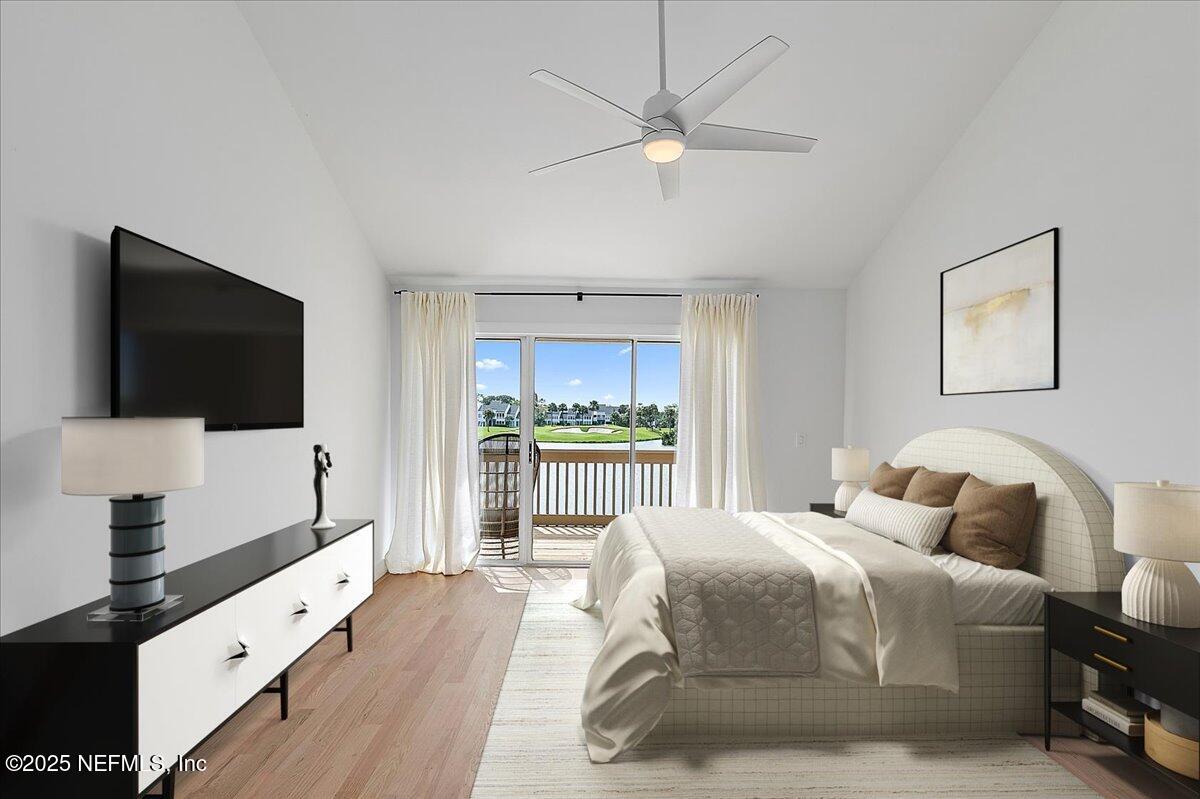 41 Fishermans Cove Road Ponte Vedra Beach, FL 32082 - Photo 21 of 36 a bedroom with a bed and a flat screen tv