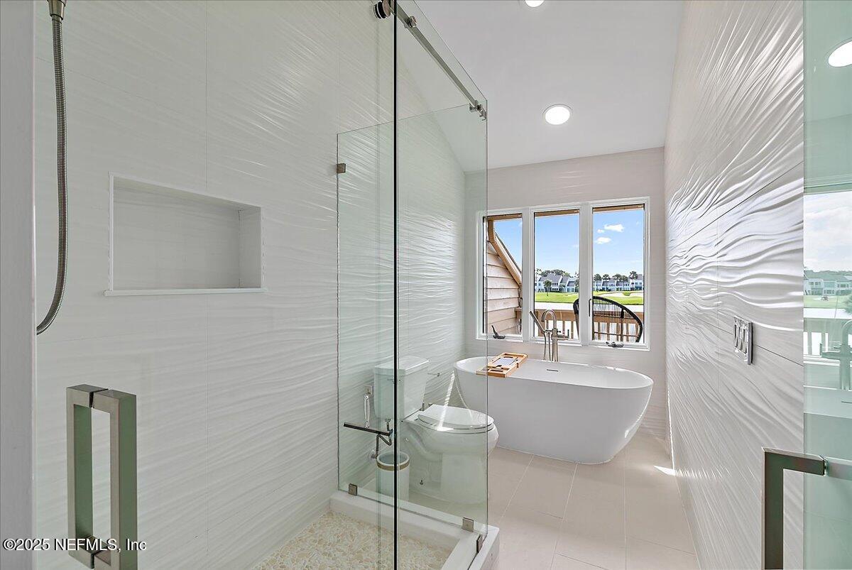 41 Fishermans Cove Road Ponte Vedra Beach, FL 32082 - Photo 27 of 36 a dining room with furniture and a floor to ceiling window