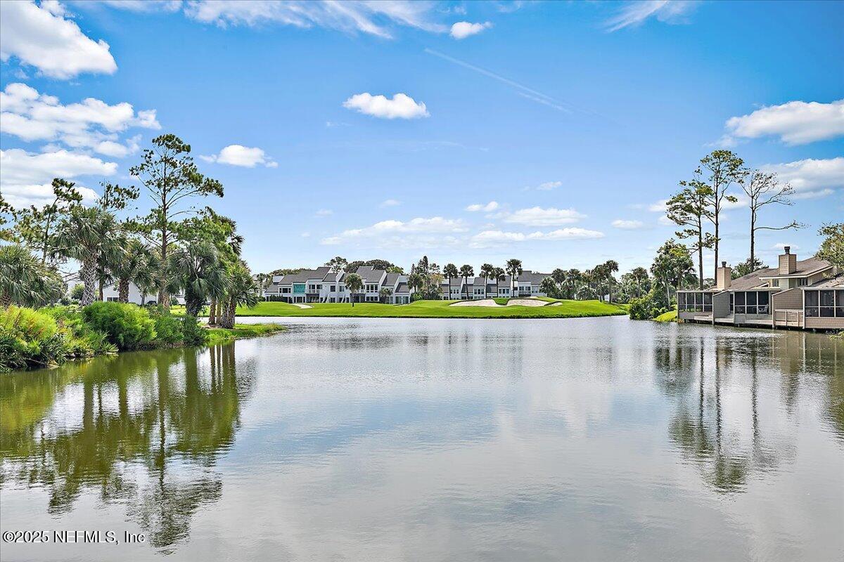 41 Fishermans Cove Road Ponte Vedra Beach, FL 32082 - Photo 10 of 36 a view of a lake with a city