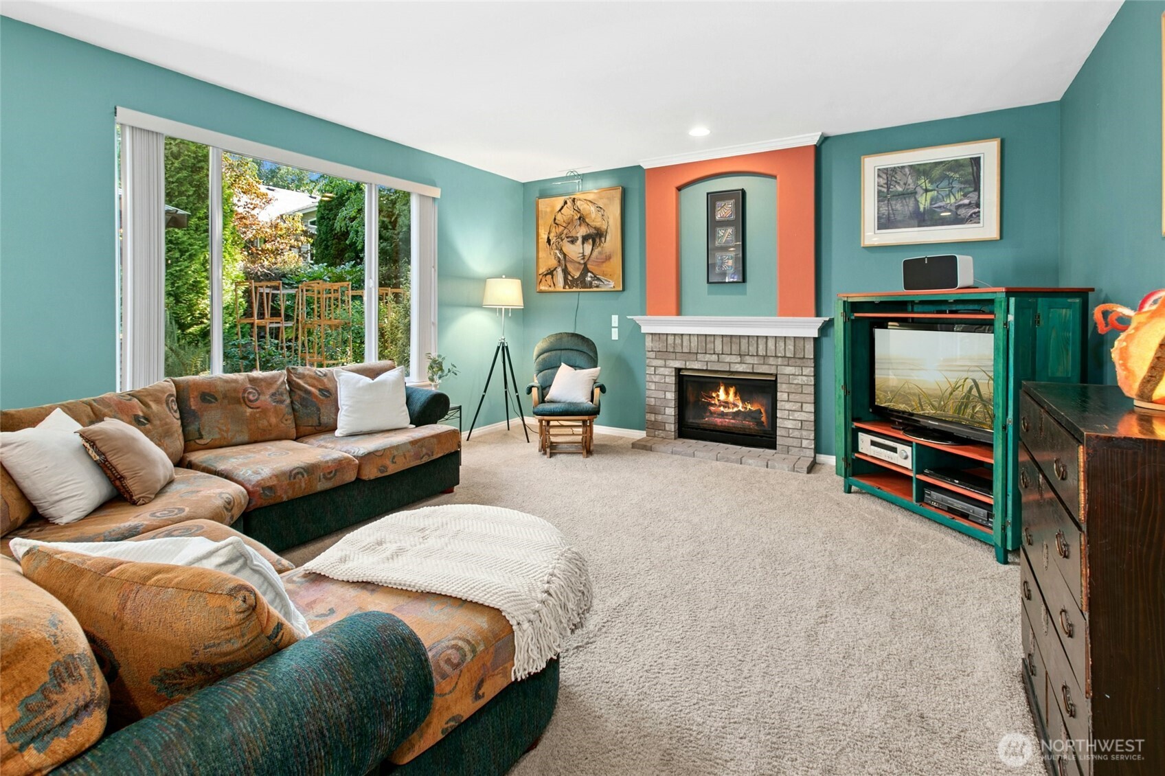 19033 29th Avenue Southeast Bothell, WA 98012 - Photo 15 of 40 a living room with furniture fireplace and flat screen tv