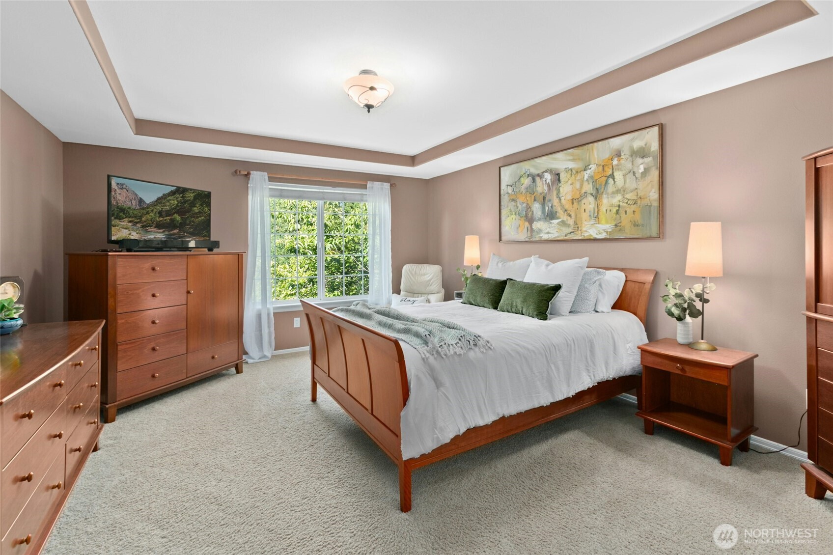 19033 29th Avenue Southeast Bothell, WA 98012 - Photo 18 of 40 a bed room with a bed and a dresser