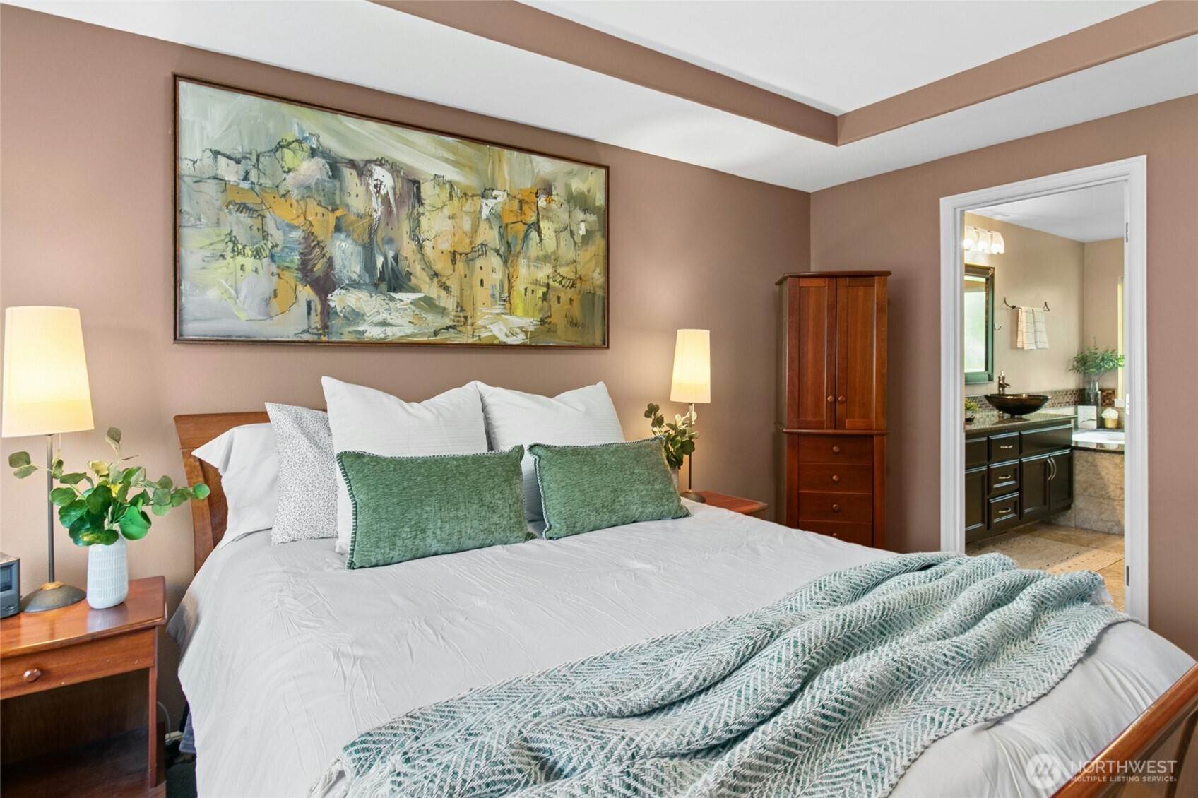 19033 29th Avenue Southeast Bothell, WA 98012 - Photo 19 of 40 a bedroom with a bed and a large mirror