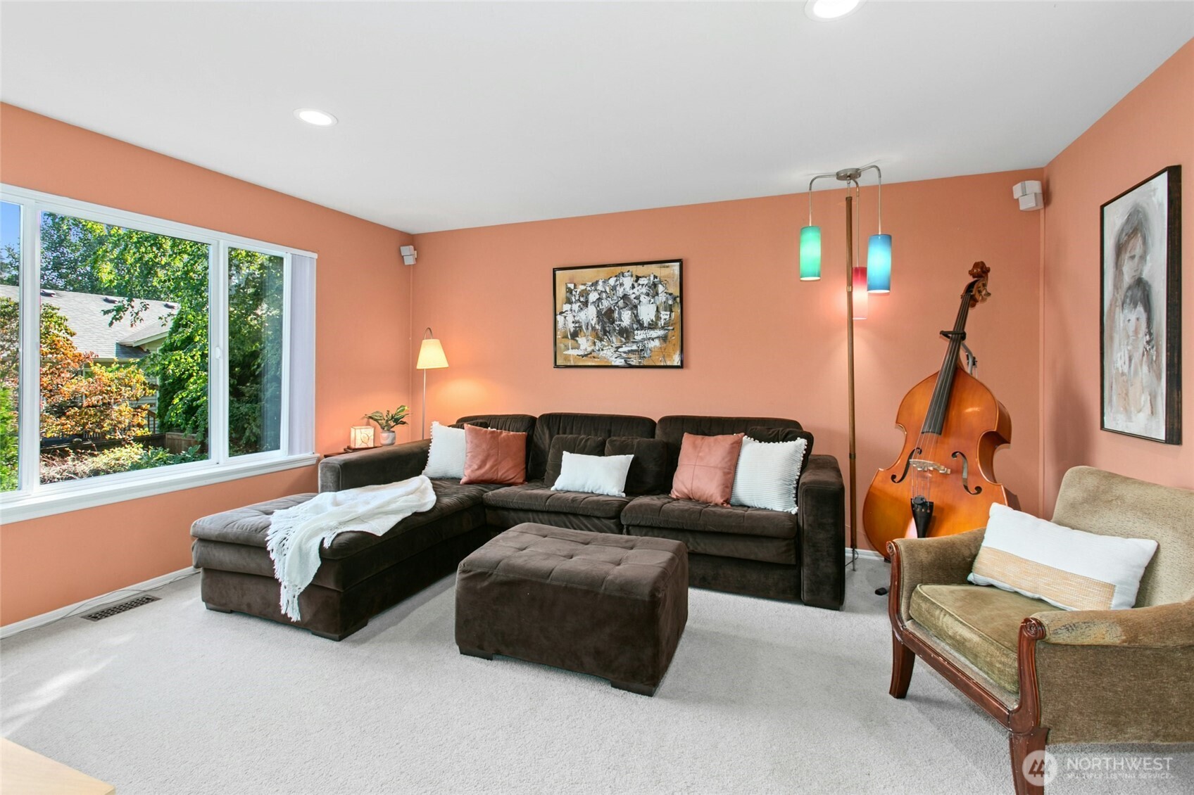 19033 29th Avenue Southeast Bothell, WA 98012 - Photo 23 of 40 a living room with furniture and a large window