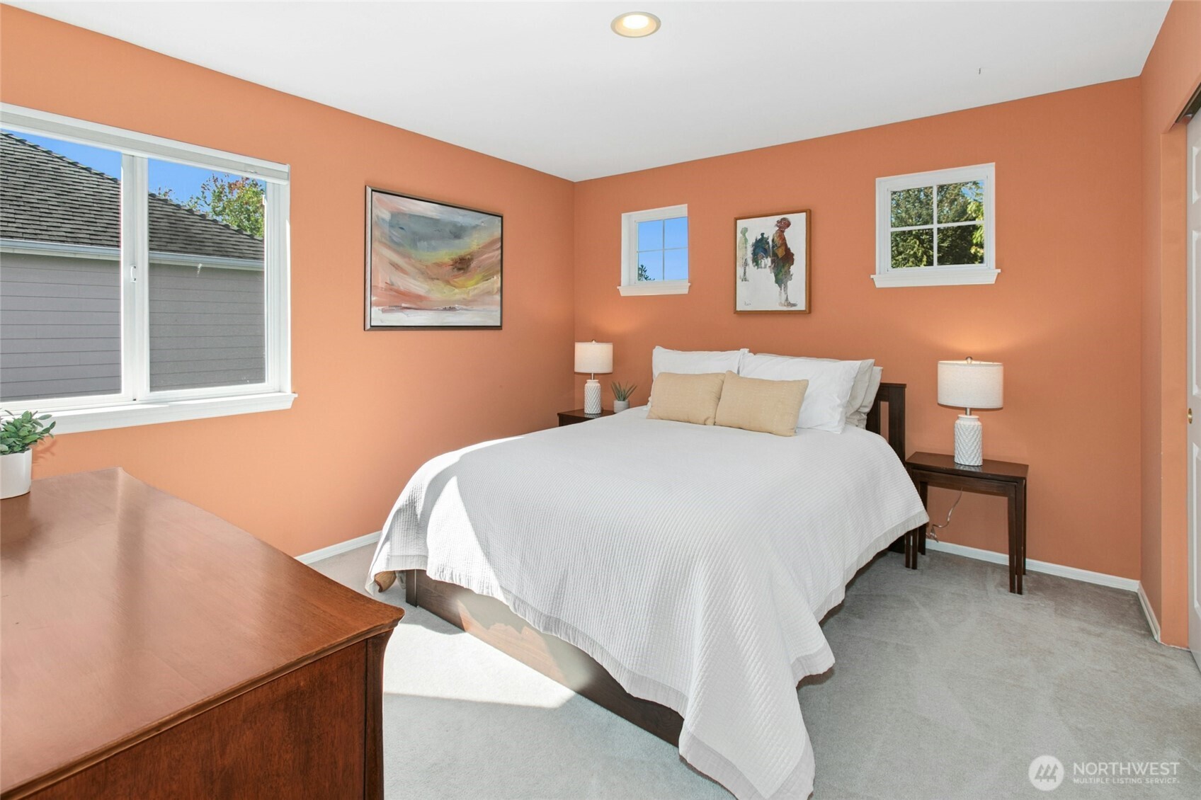 19033 29th Avenue Southeast Bothell, WA 98012 - Photo 25 of 40 a bedroom with a bed and wooden floor