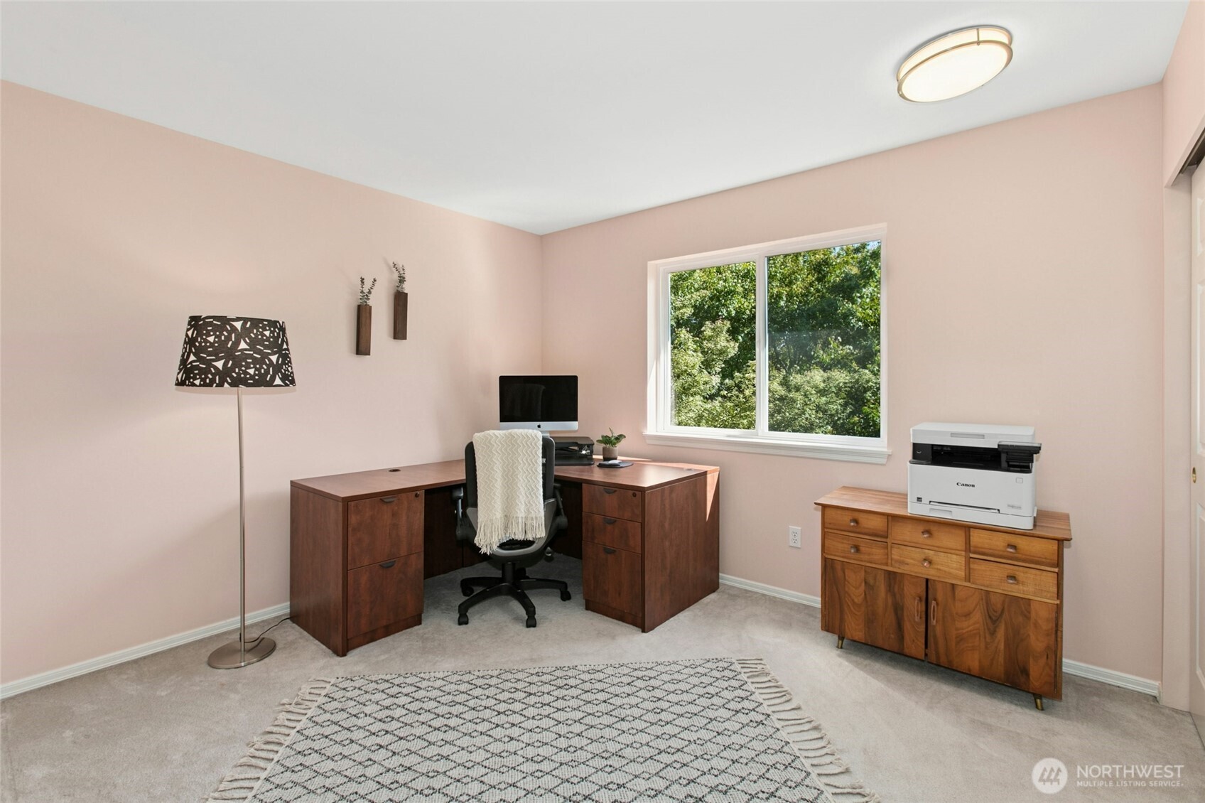 19033 29th Avenue Southeast Bothell, WA 98012 - Photo 27 of 40 a view of a workspace with furniture and a window