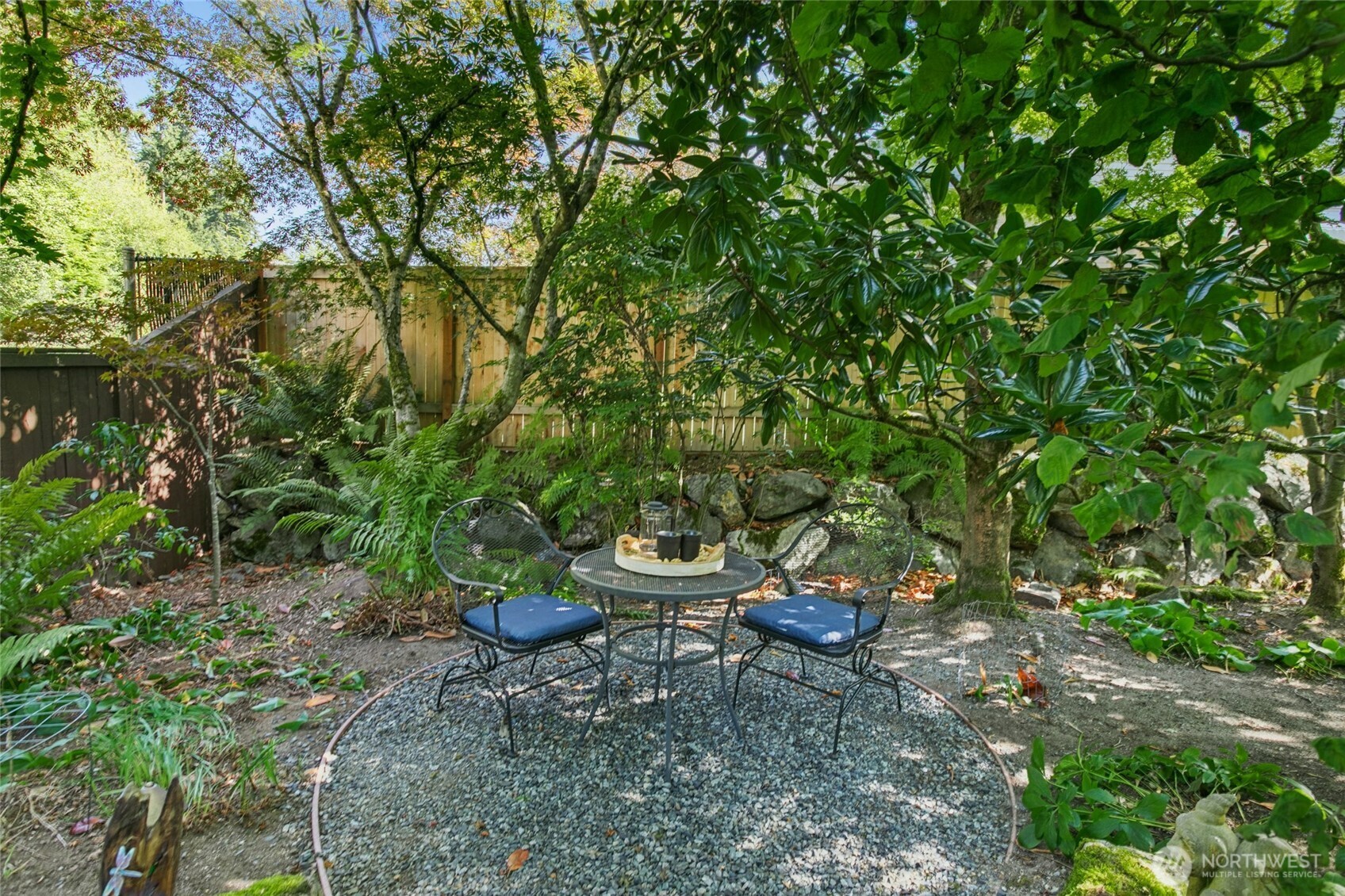 19033 29th Avenue Southeast Bothell, WA 98012 - Photo 32 of 40 a backyard of a house with a table and chairs