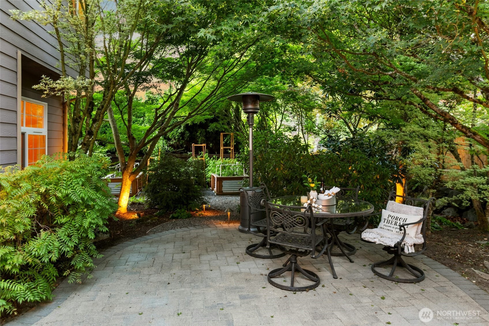 19033 29th Avenue Southeast Bothell, WA 98012 - Photo 33 of 40 a view of a backyard with sitting area and furniture