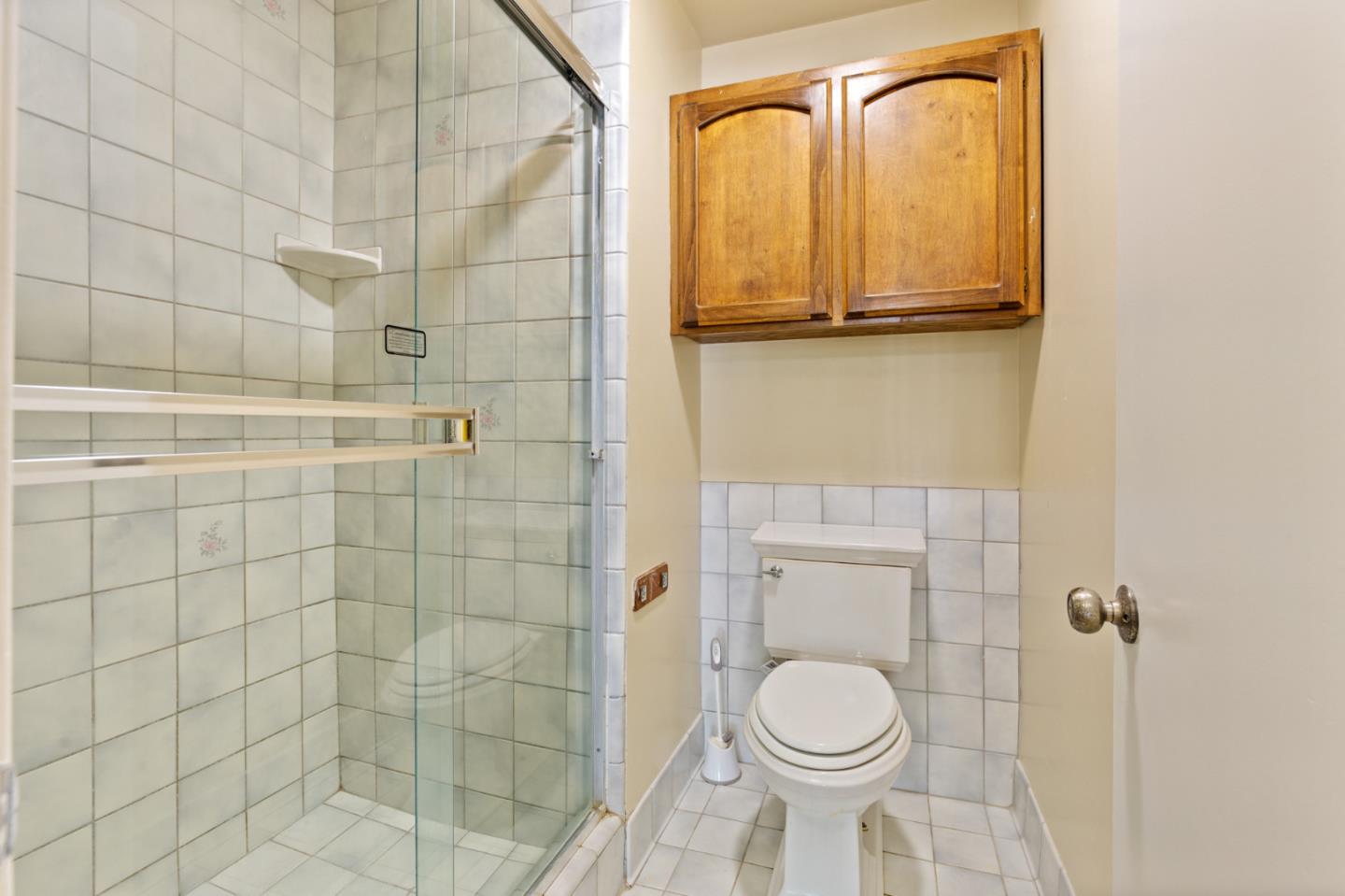 7034 Vía Pradera San Jose, CA 95139 - Photo 24 of 31 a bathroom with a toilet and a shower