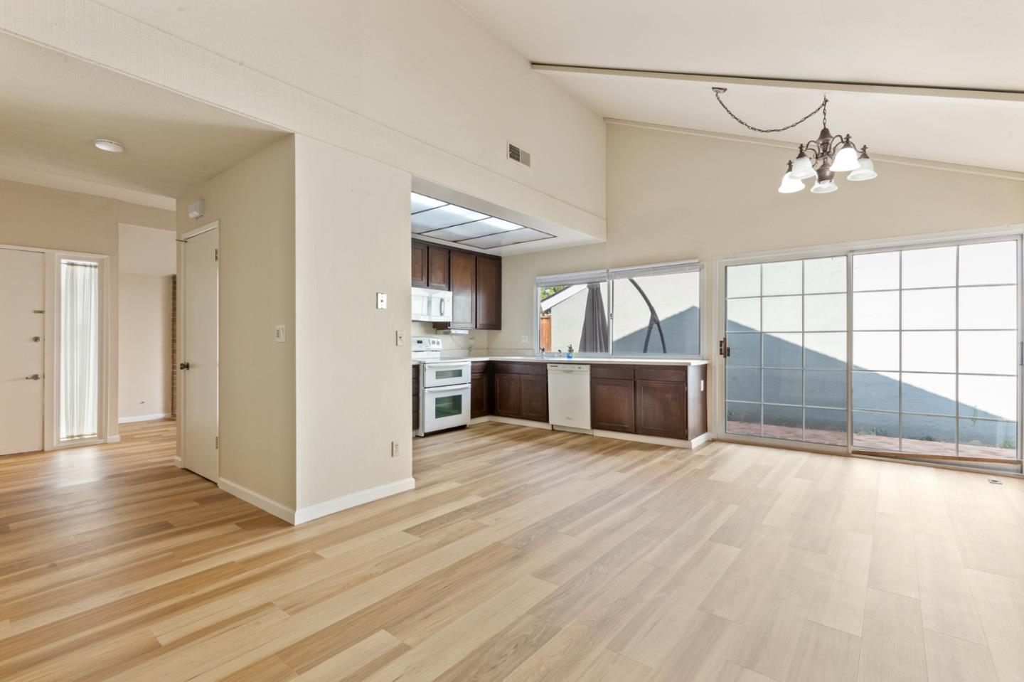 7034 Vía Pradera San Jose, CA 95139 - Photo 10 of 31 a view of a kitchen with a sink and a kitchen counter top space