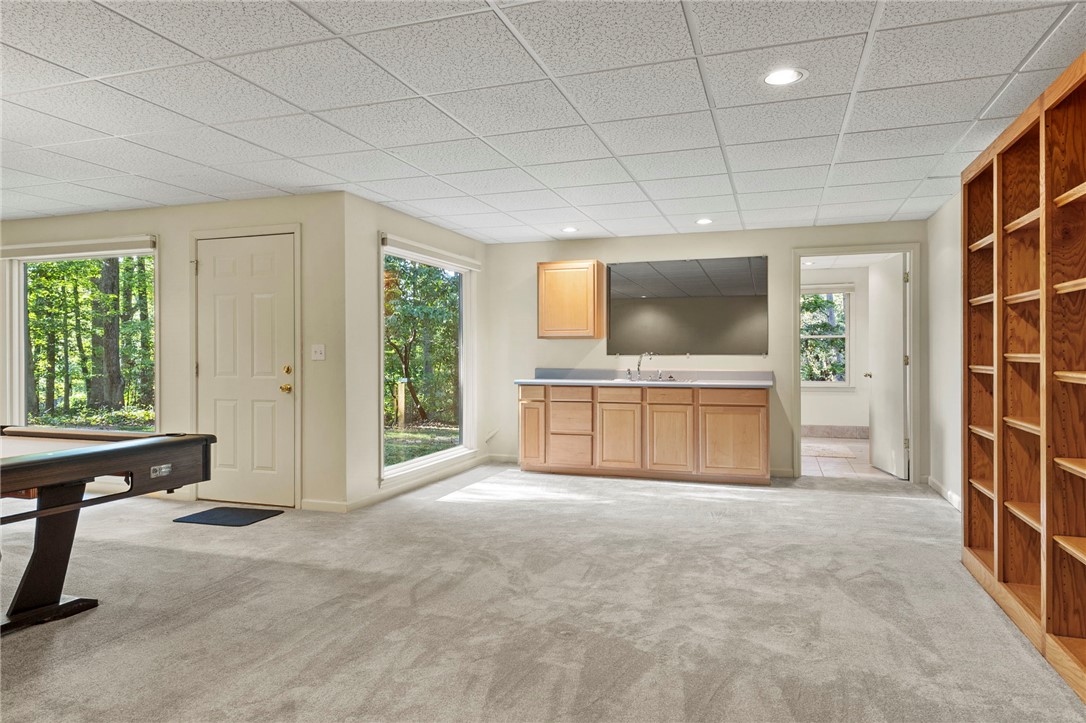 225 Arrowhead Trail Easley, SC 29642 - Photo 32 of 33 This versatile recreation room offers a perfect space for entertainment, complete with ample natural light.
