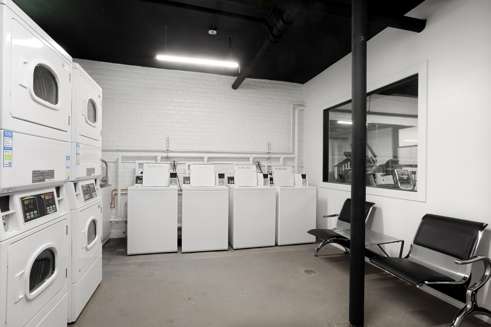 1708 West Juneway Terrace, Unit 2J Chicago, IL 60626 - Photo 13 of 13 a view of a storage & utility room with dryer and washer