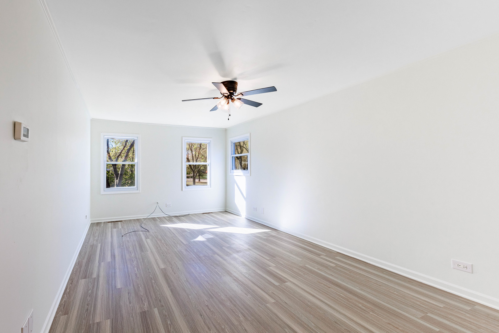1224 West Whytecliff Road Palatine, IL 60067 - Photo 19 of 50 wooden floor in an empty room with a window