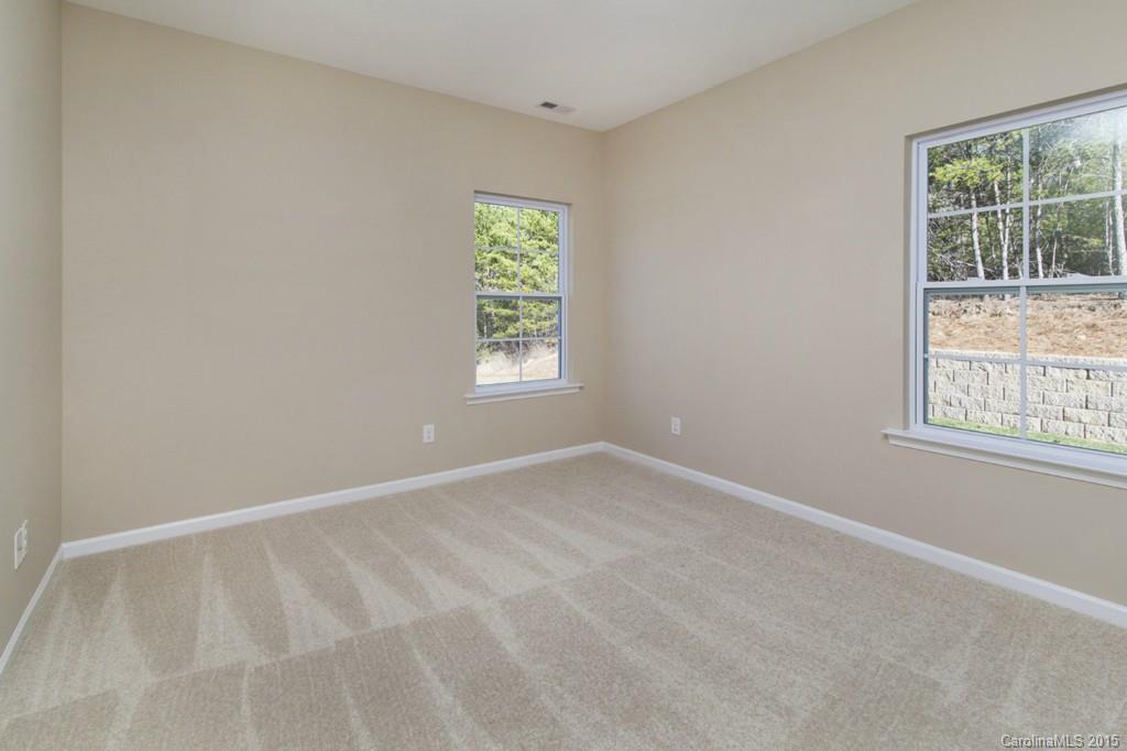 710 Old Cove Road, Unit 42 Tega Cay, SC 29708 - Photo 12 of 23 an empty room with a window