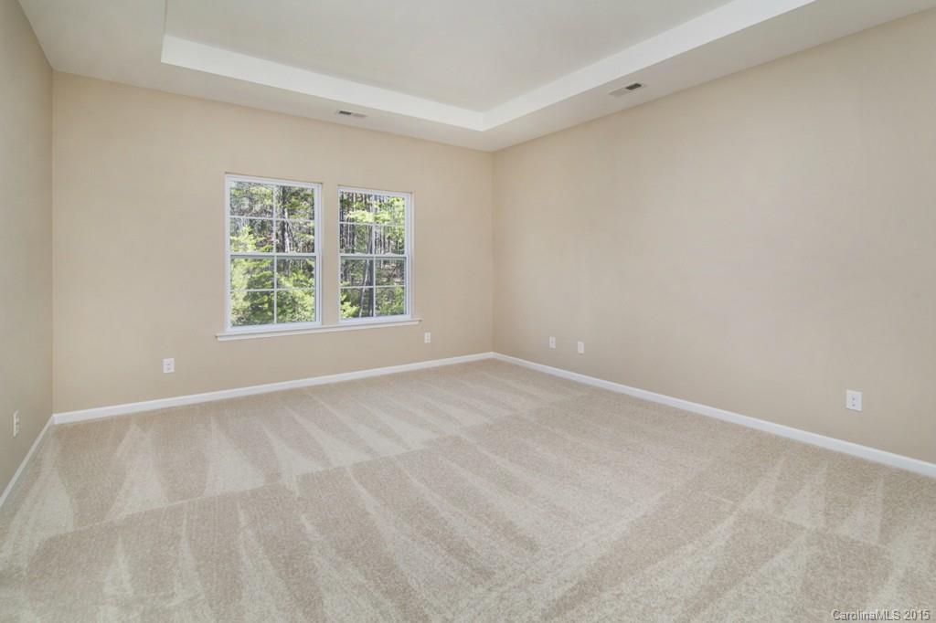 710 Old Cove Road, Unit 42 Tega Cay, SC 29708 - Photo 14 of 23 an empty room with a window