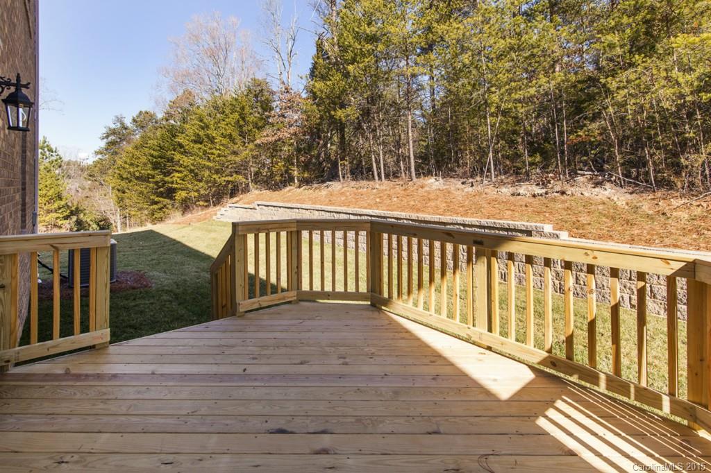 710 Old Cove Road, Unit 42 Tega Cay, SC 29708 - Photo 22 of 23 a view of balcony with wooden floor