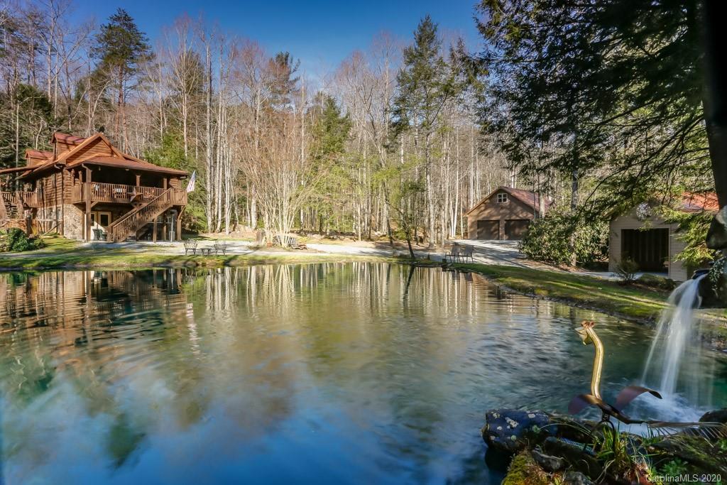 997 Proctor Road Lake Lure, NC 28746 - Photo 2 of 40 a view of a lake with houses