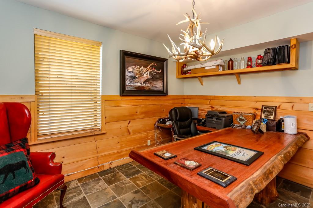 997 Proctor Road Lake Lure, NC 28746 - Photo 17 of 40 a view of a room with gym equipment