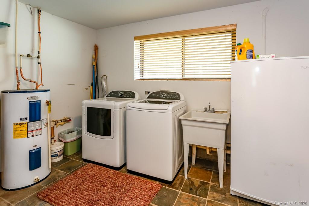 997 Proctor Road Lake Lure, NC 28746 - Photo 22 of 40 a utility room with dryer and washer