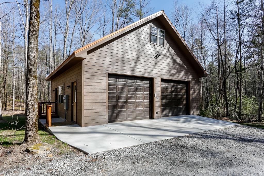 997 Proctor Road Lake Lure, NC 28746 - Photo 25 of 40 a view of a house with a small backyard