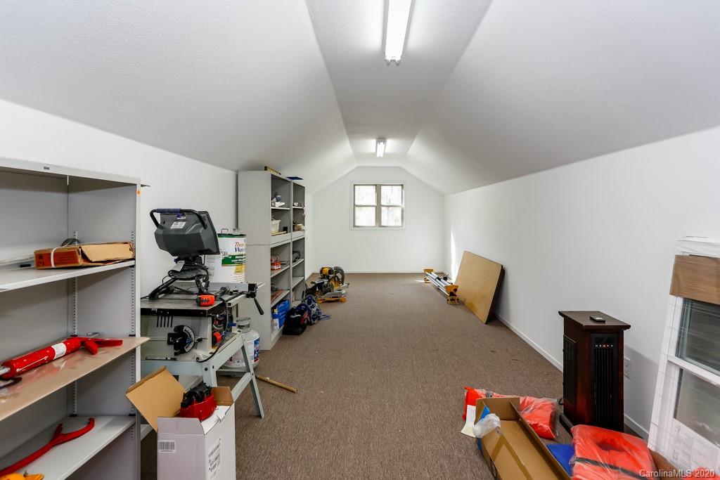 997 Proctor Road Lake Lure, NC 28746 - Photo 26 of 40 a view of a room with gym equipment