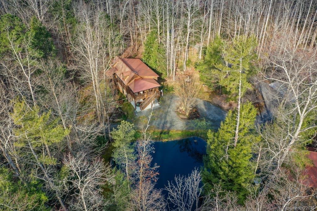 997 Proctor Road Lake Lure, NC 28746 - Photo 37 of 40 an aerial view of a house with a yard
