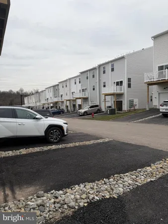 a car parked in front of a building