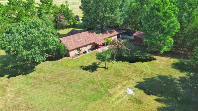 a view of a garden from a balcony