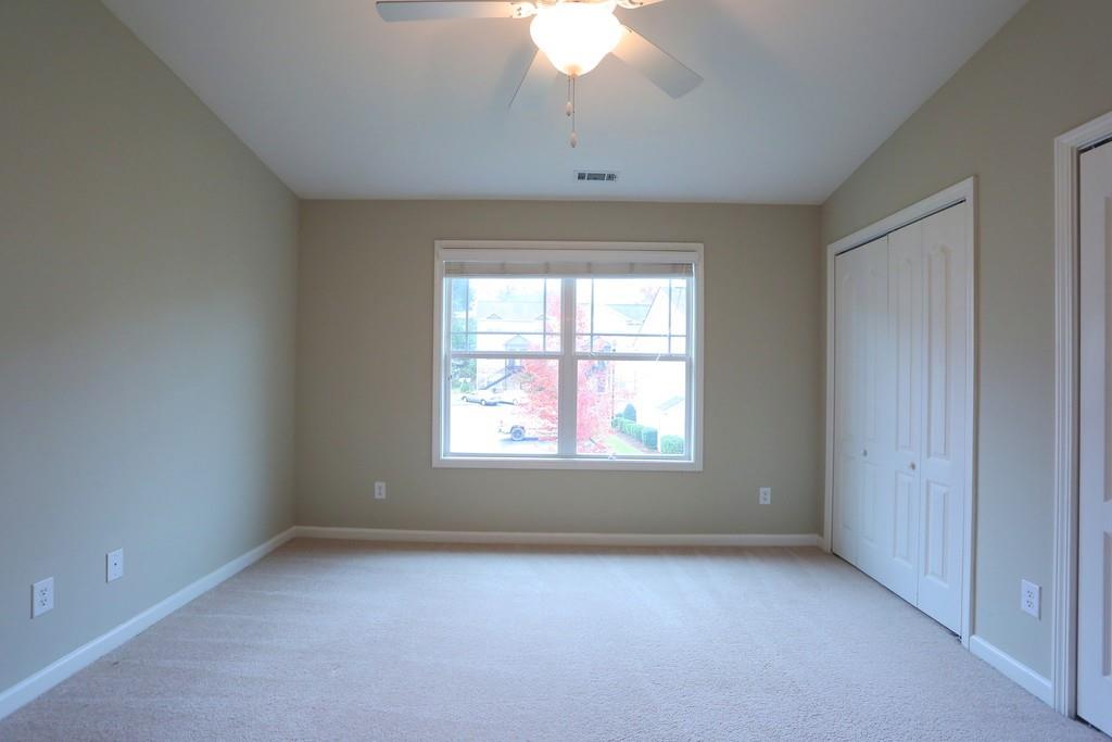 232 Epps Bridge Road, Unit 1A Athens, GA 30606 - Photo 11 of 14 an empty room with a window