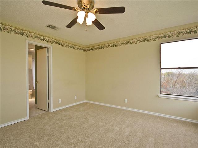 1411 Clearview Loop Round Rock, TX 78664 - Photo 10 of 13 Empty room with baseboards, visible vents, light carpet, and ceiling fan