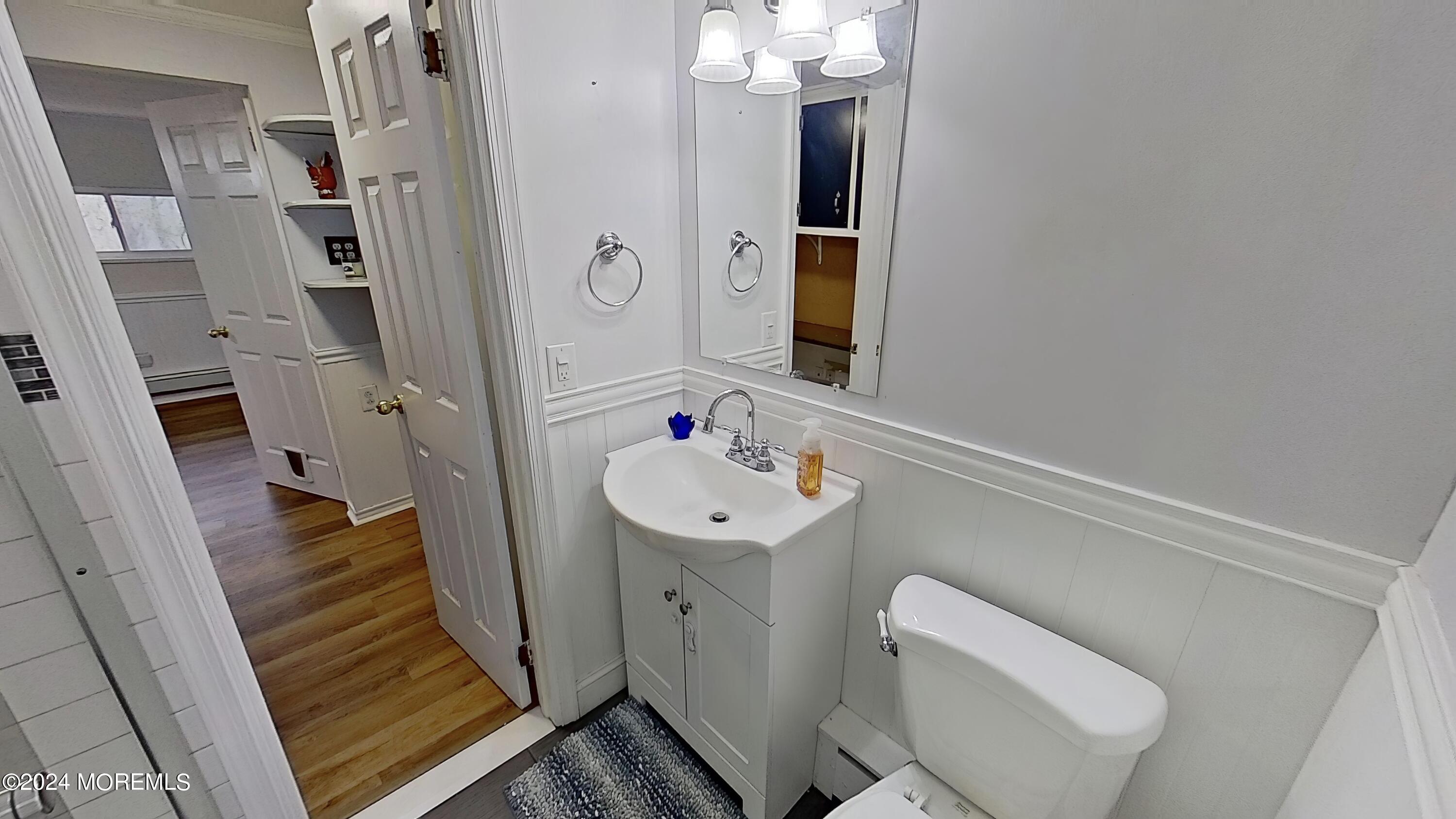 144 Windeler Road Howell, NJ 07731 - Photo 49 of 59 a bathroom with a sink toilet and shower